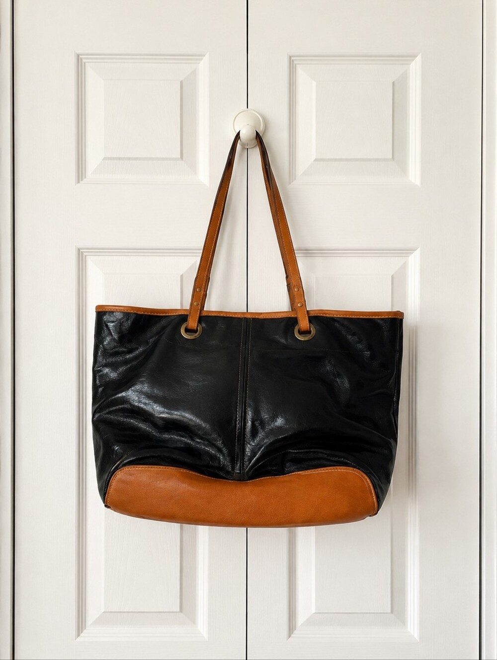 NINE WEST Black and Tan Patent Leather Handbag.